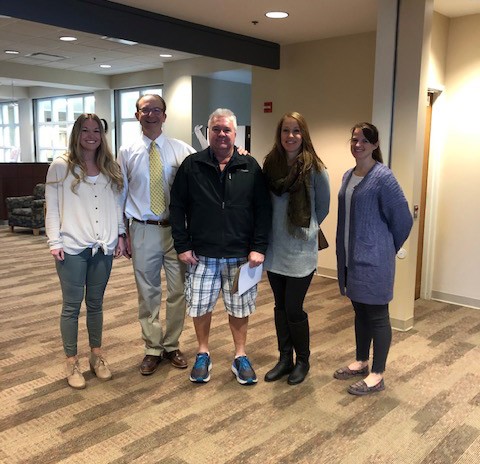 Alan Rager with Dr. Wright and group of staff